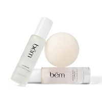 Bēm Skincare products including serums and a konjac facial sponge on a white background