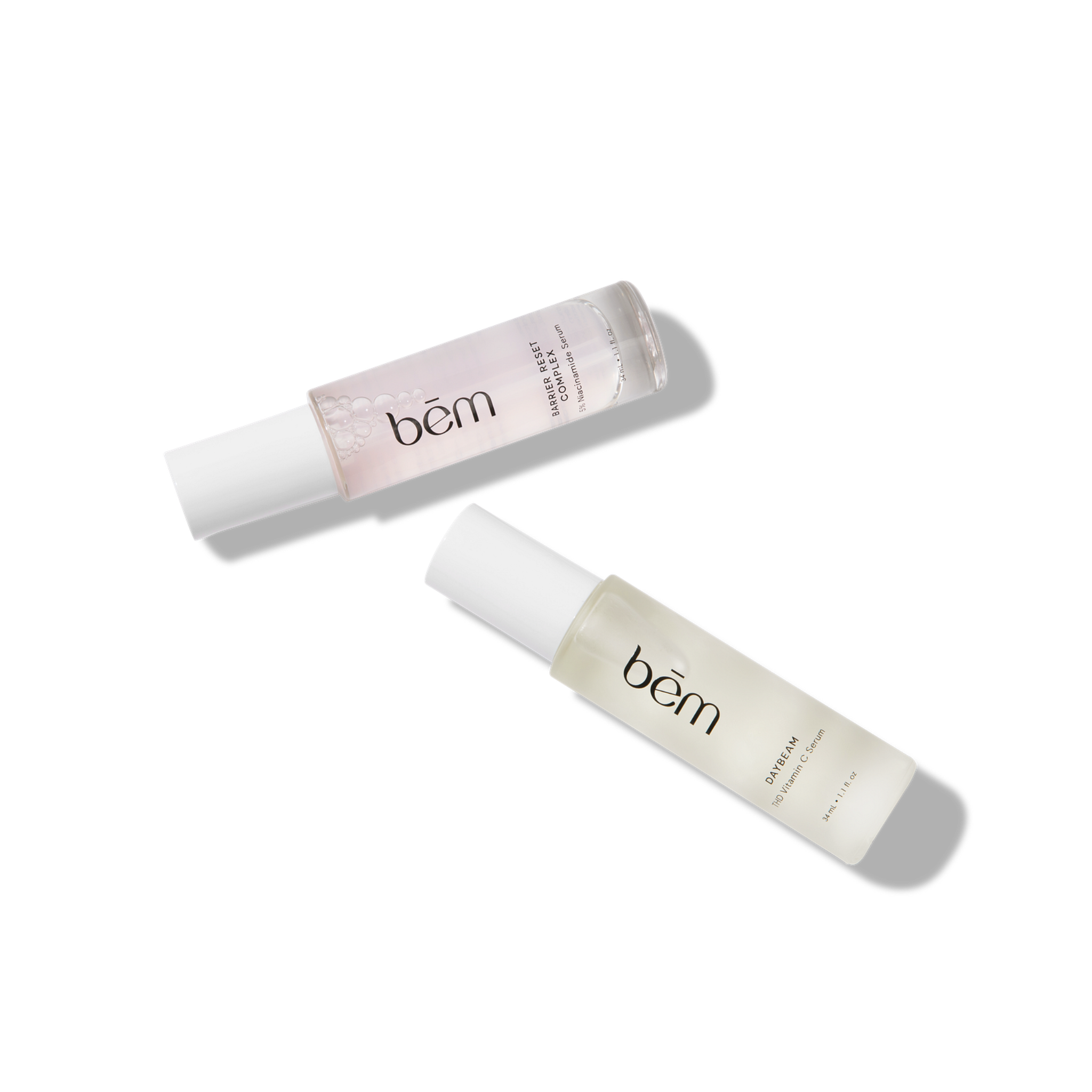 Bēm Barrier Reset Complex and Daybeam serum bottles on a white background
