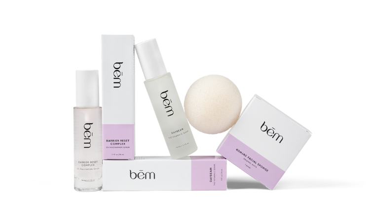 Bēm Skincare products including bottles, boxes, and a facial sponge on a white background