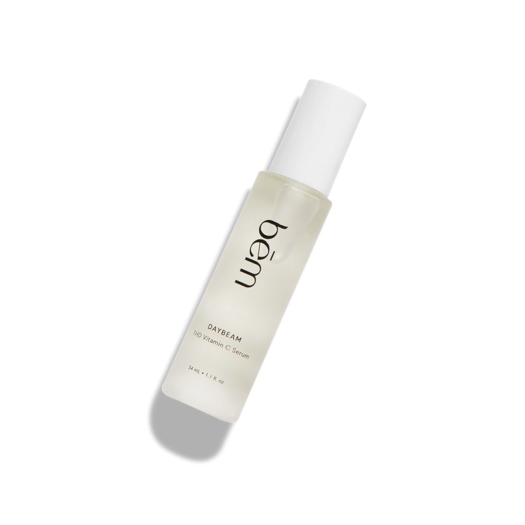 Daybeam serum bottle on light background