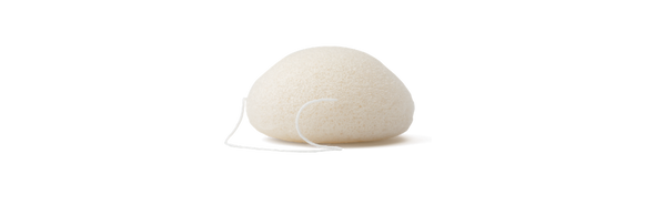 White facial sponge on a white background